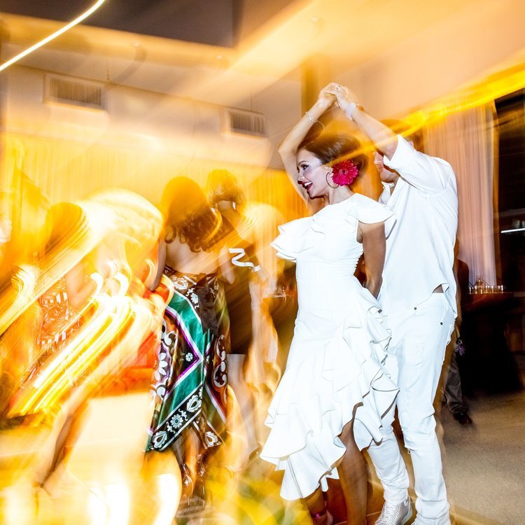 Fun+couple+dancing+at+cuban+themed+private+social+event.jpg