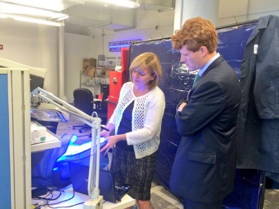 Donna Brezinski demonstrating the bili-hut™ to Congressman Joe Kennedy III, at MassChallenge