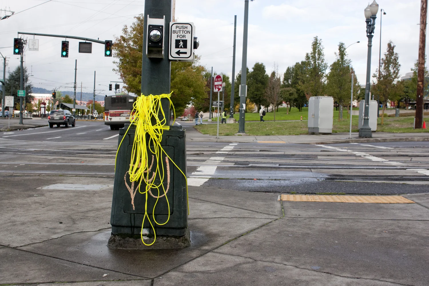 Tactically introduced into the public landscape, these non-functional material additions served as tests to discover what caught the attention of passers-by. To facilitate these experiments, limitations were established for material, location, and target verb. I installed a defined set of materials in public locations and observed the reactions of people as they encountered it. Five installations were completed, using three variations of materials, in two different locations. The intentions of these experiments were threefold: First, gain an understanding or insight into the reactions of people to these obscure objects. Second, to establish a comfort with working in this guerilla, public arena. Finally, to explore the materiality of a limited palette of building blocks, and use that understanding to inform the next phase.