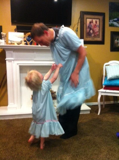Skye twirling with her father in matching jammies, perfect for twirling! 