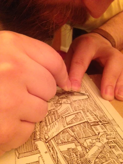 Process shot - Joseph carving his printing block.