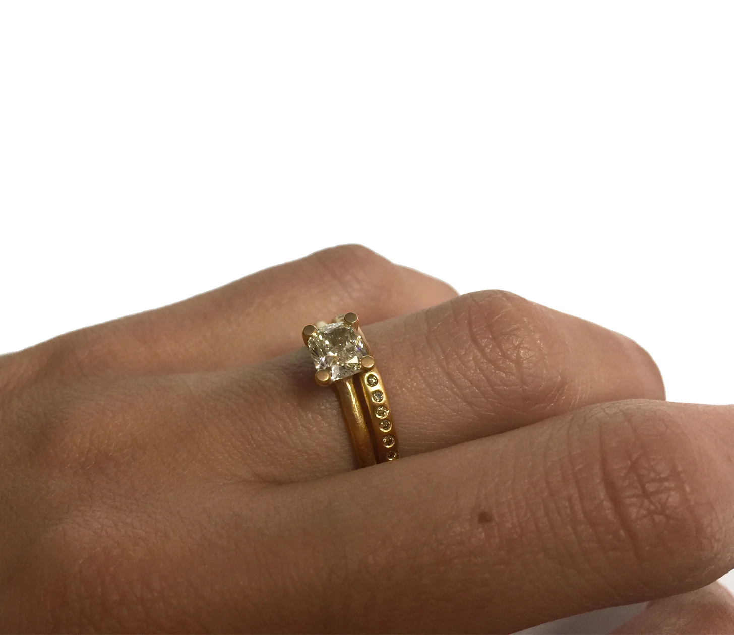 18carat-yellow-gold-cushion-cut-diamond-solitaire-engagement-ring-(set-on-hand).jpg