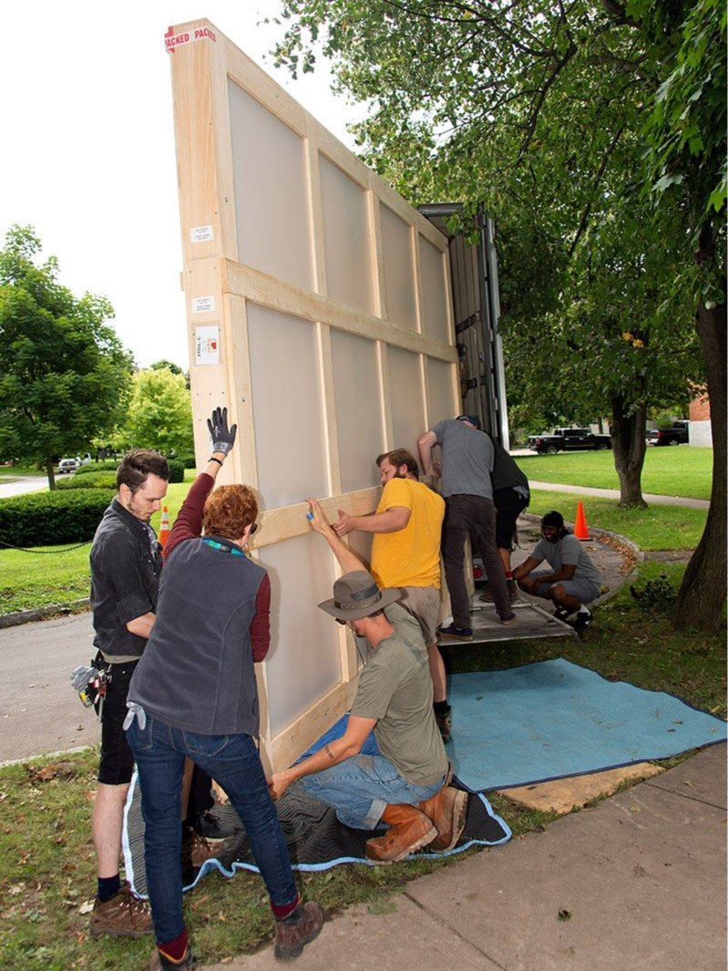  Continuing to navigate a large travel frame containing a Clyfford Still painting into a low-profile tractor trailer with a large team of preparators. 