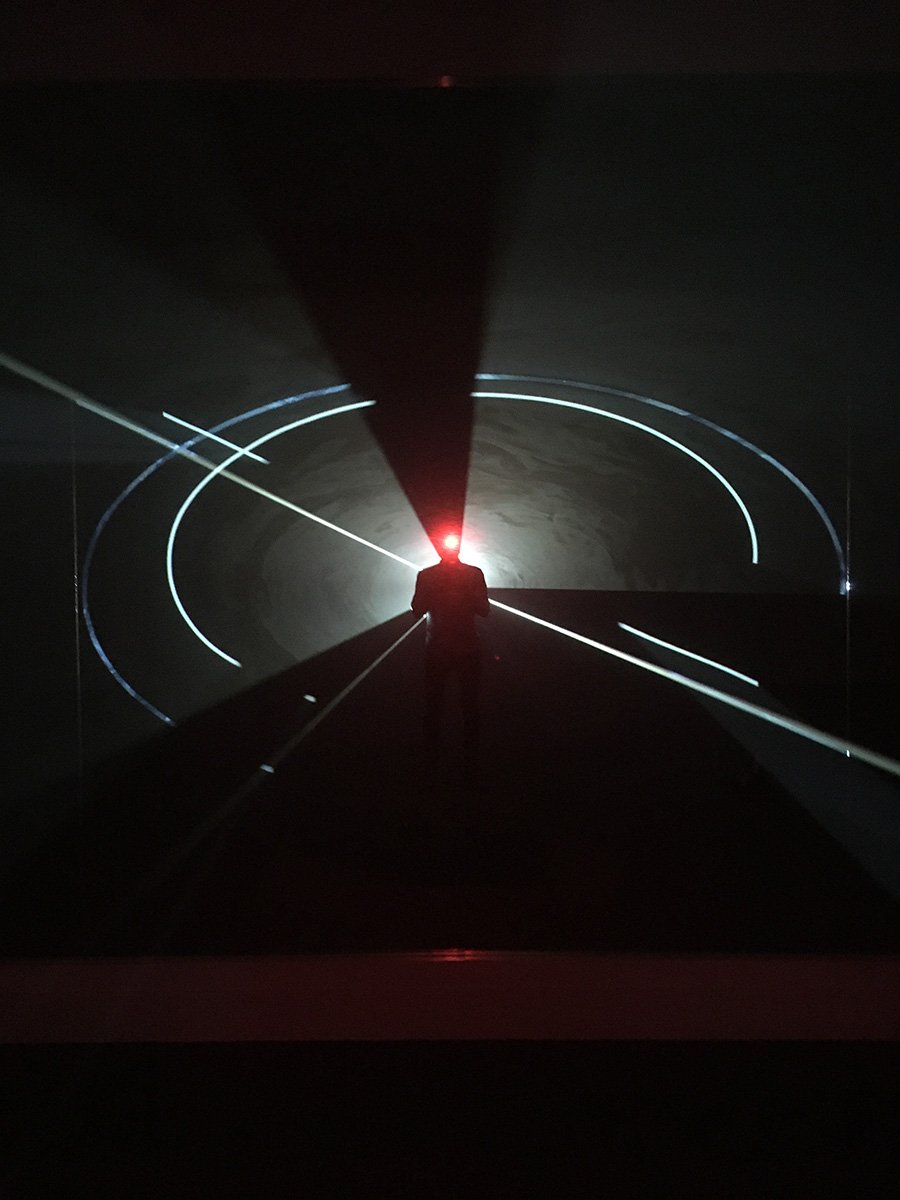  Finishing adjustments on Anthony McCall’s  Dark Rooms, Solid Light  in 2019. 