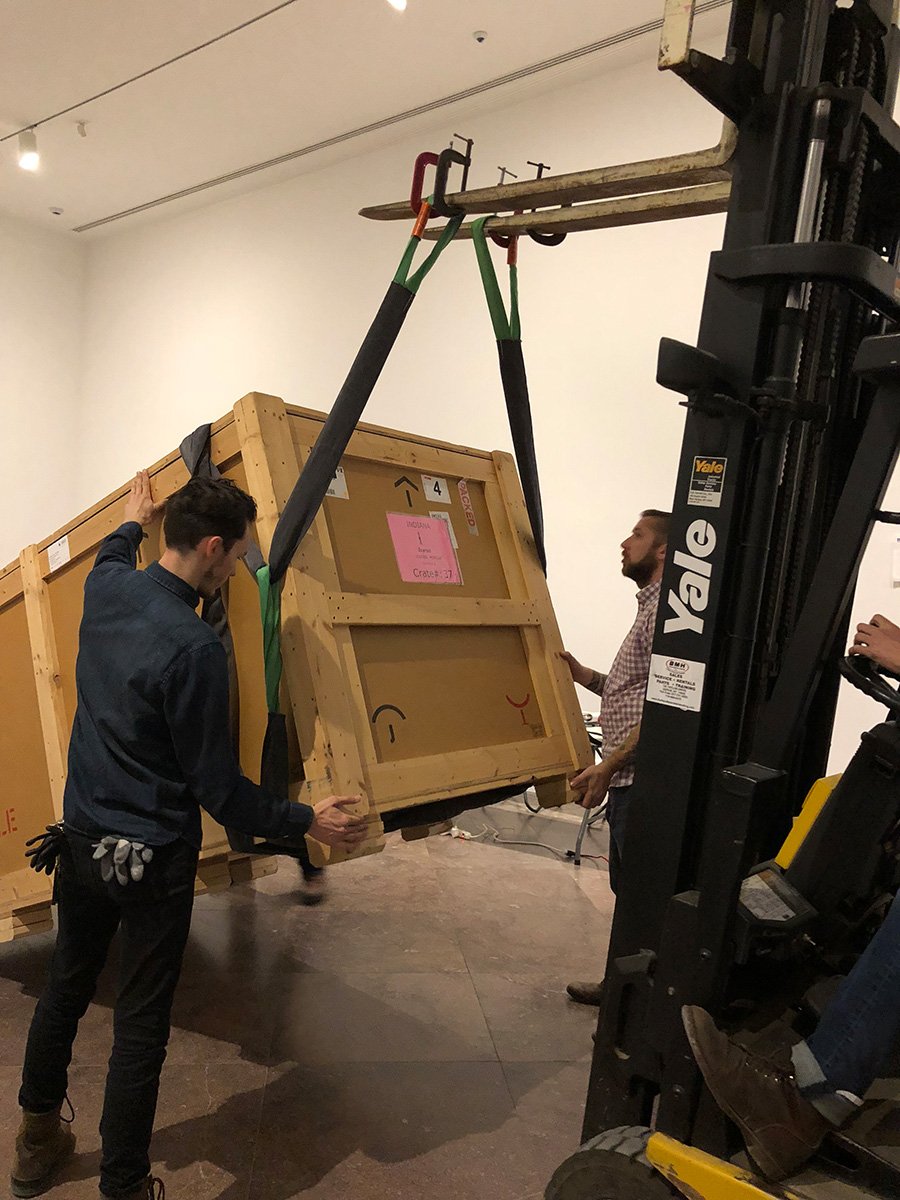  Uprighting a Robert Indiana crate that was too tall to fit into the gallery in its proper orientation. 
