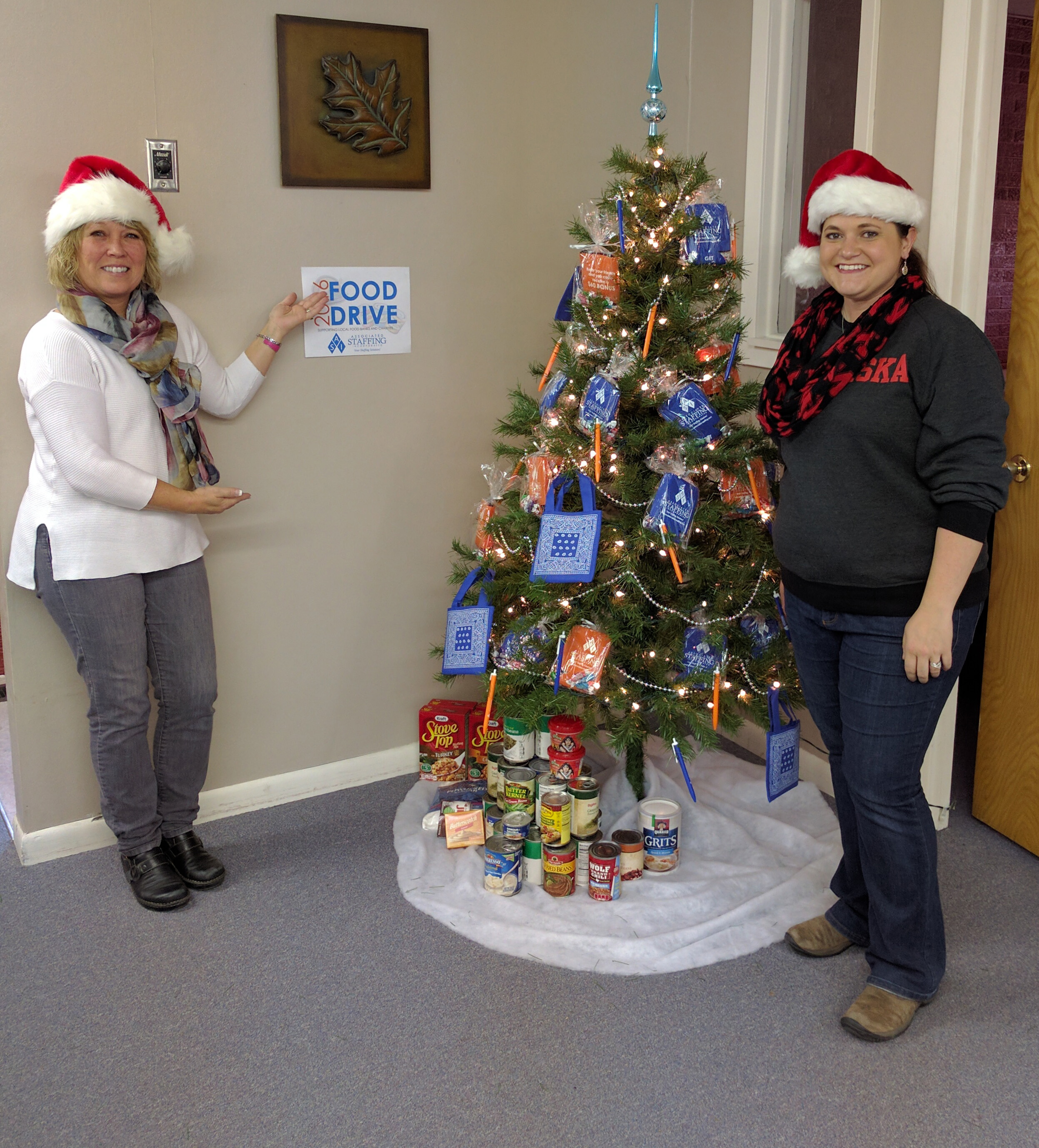 Kearney Branch Manager Kim and Kearney Recruiter Shonda with the start of their Food Drive donations.