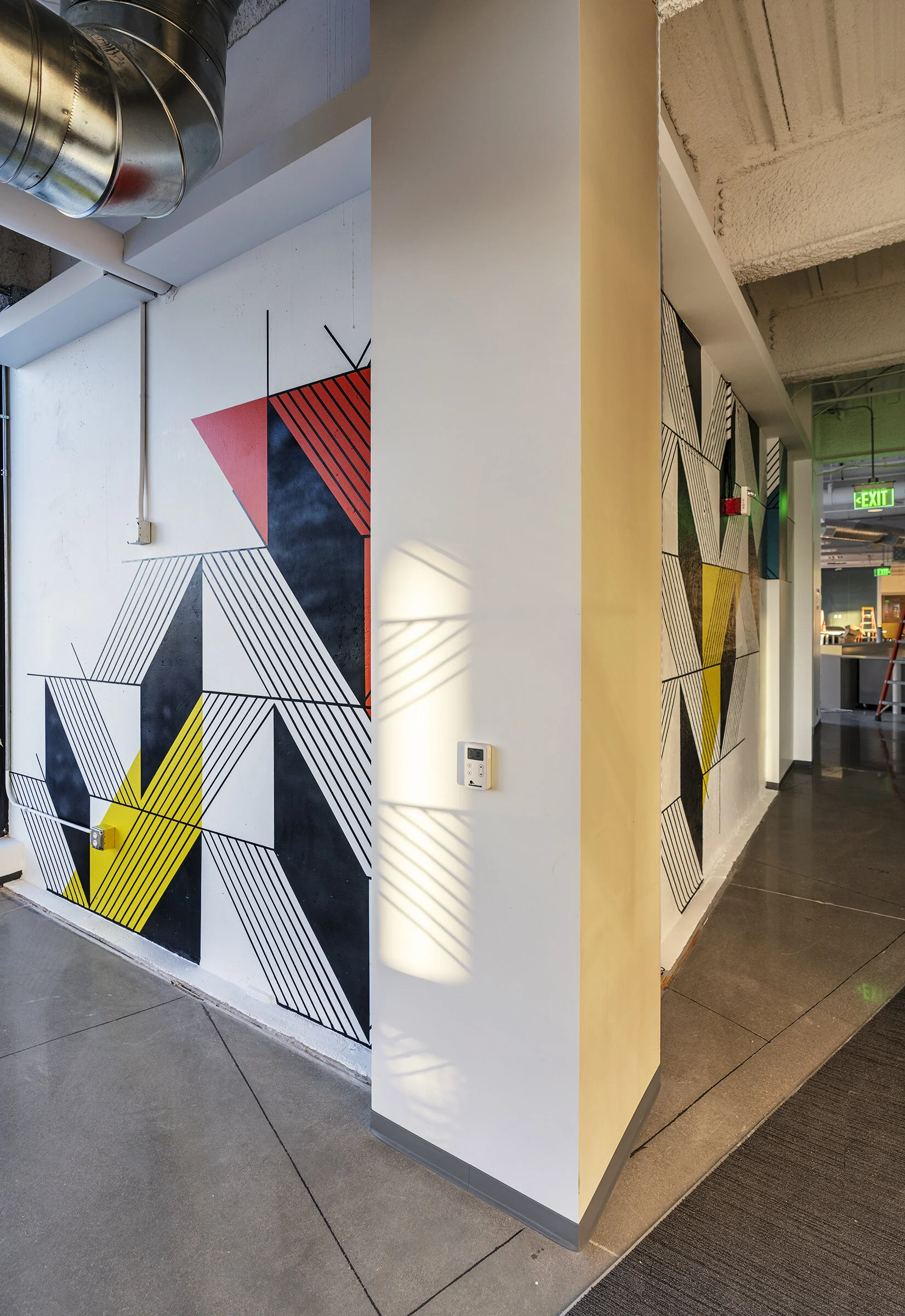 EverCommerce, 29x10’, Acrylic, Denver, CO, 2020. Photo: Peter Kowalchuck