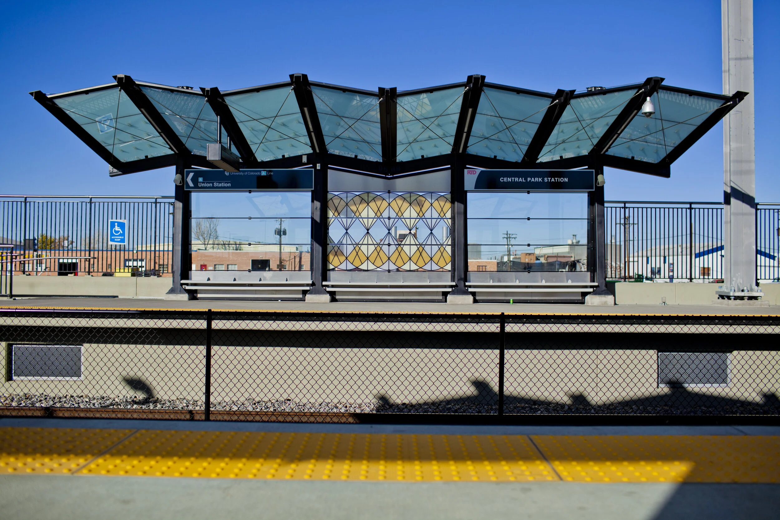 RTD A Line Windscreens Commission, "Tumbleweeds Really Do Exist", 5 Stations, Ceramic Frit on Glass, Denver, CO, 2016 (Central Park Station, 1 of 8 bays)