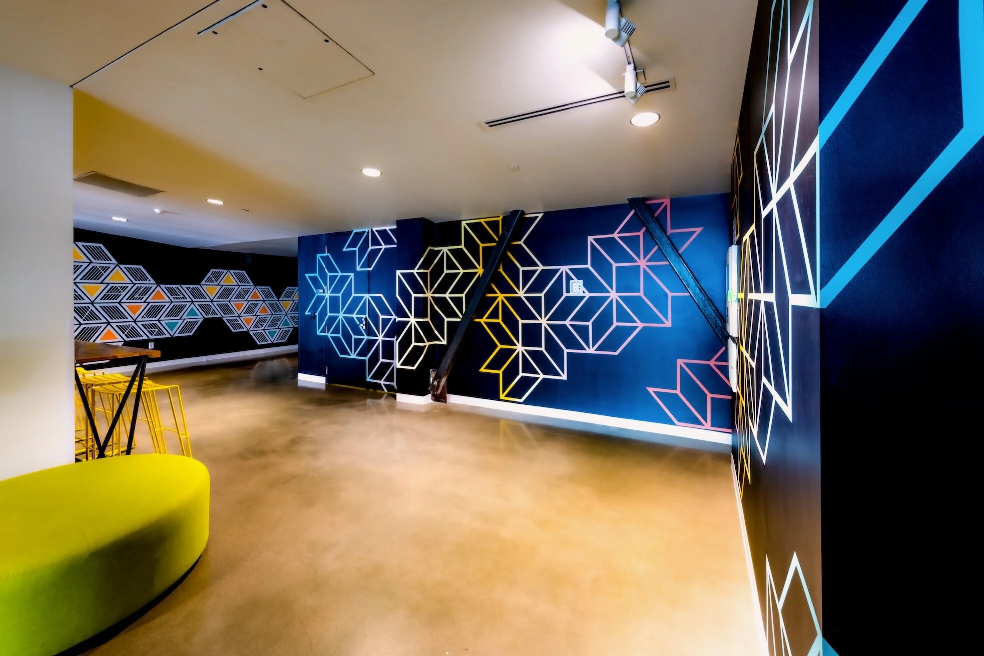  "Moving Through", Acrylic paint, 2021 &amp; “Writing on the Wall”, Acrylic paint and acrylic panels, 2015, Nichols Partnership/Galvanize Lobby, Denver, CO. Photo by: Travis Rummel 