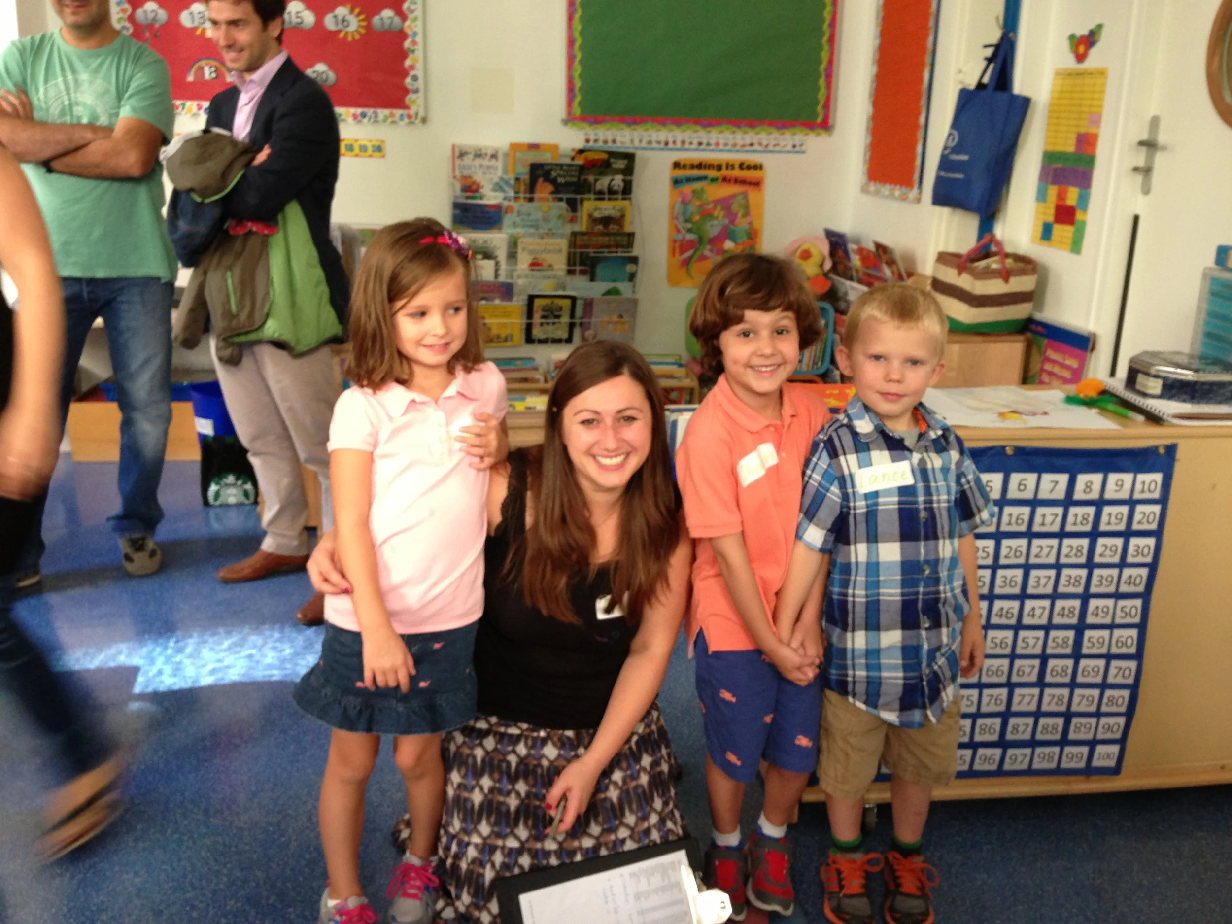 Lance with his Kindergarten teacher and friends, Bridget and Charlie.&nbsp;