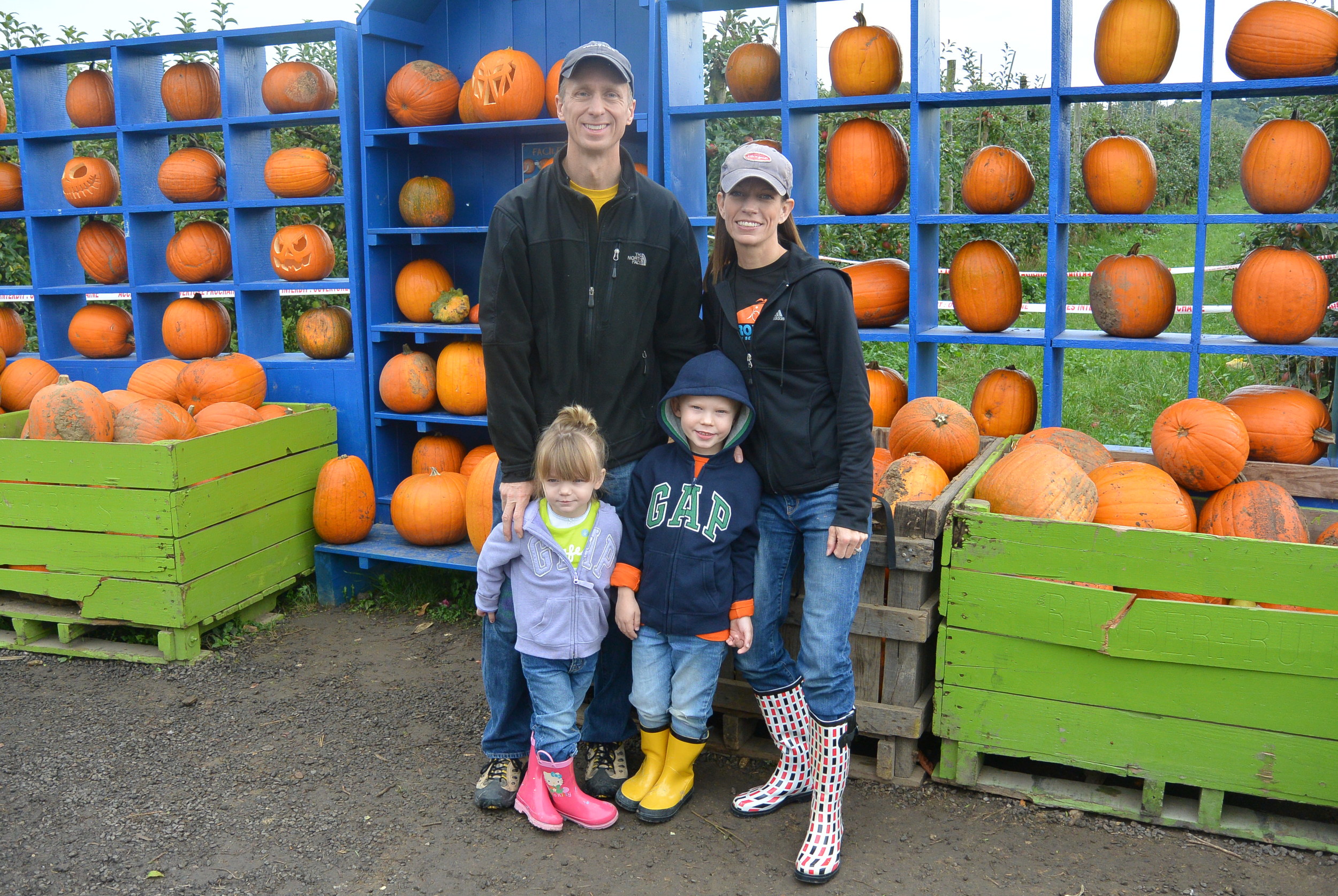 family picture by the pumpkins