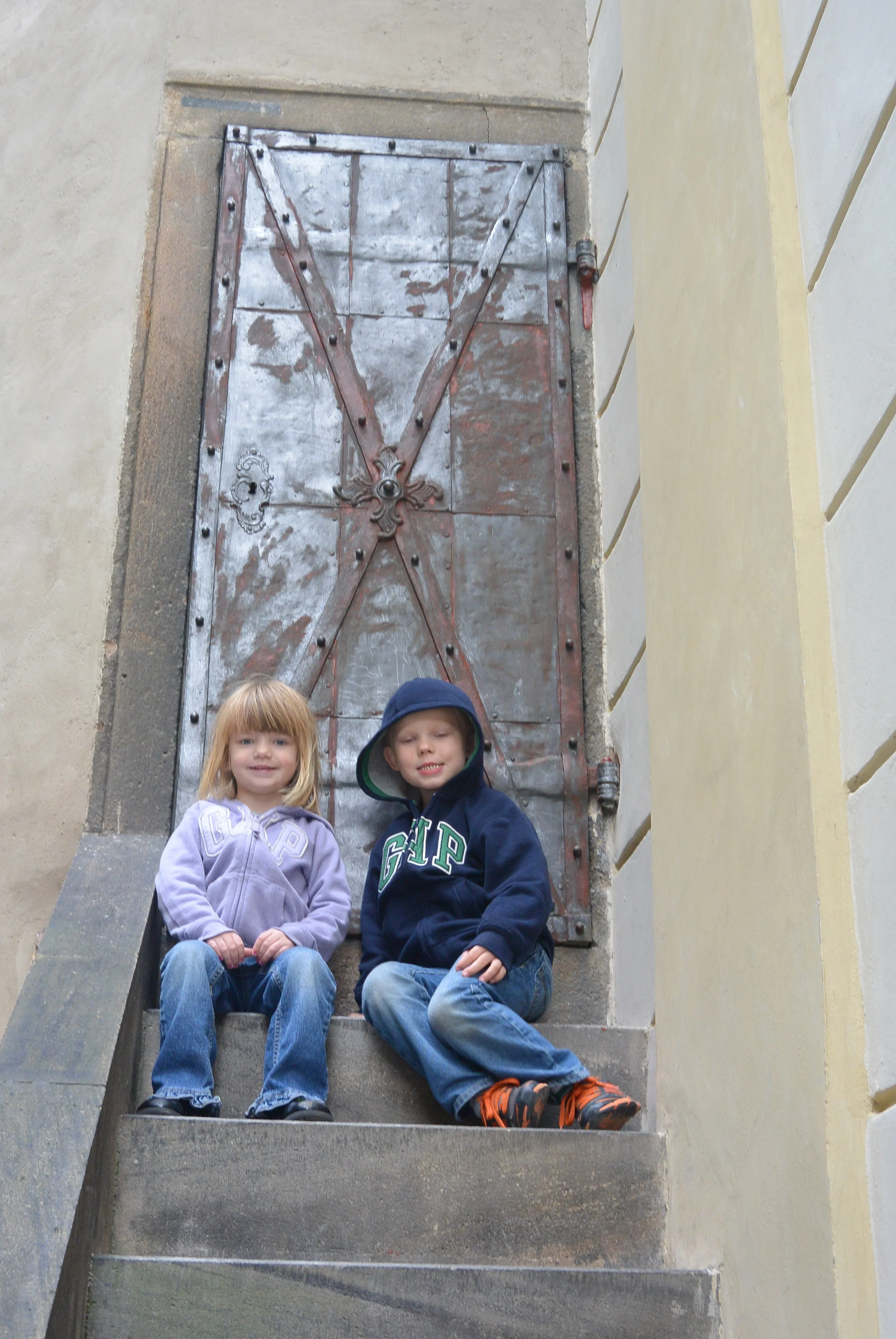 kids just resting on some steps.