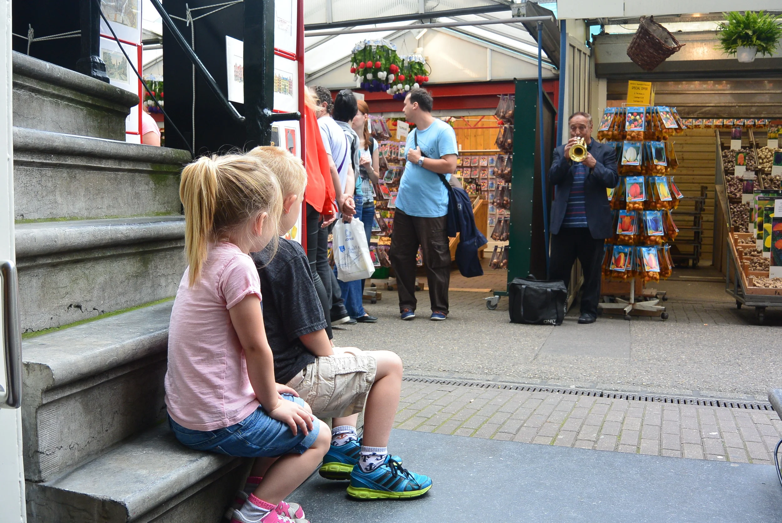 kids enjoying some entertainments as we hit a shop