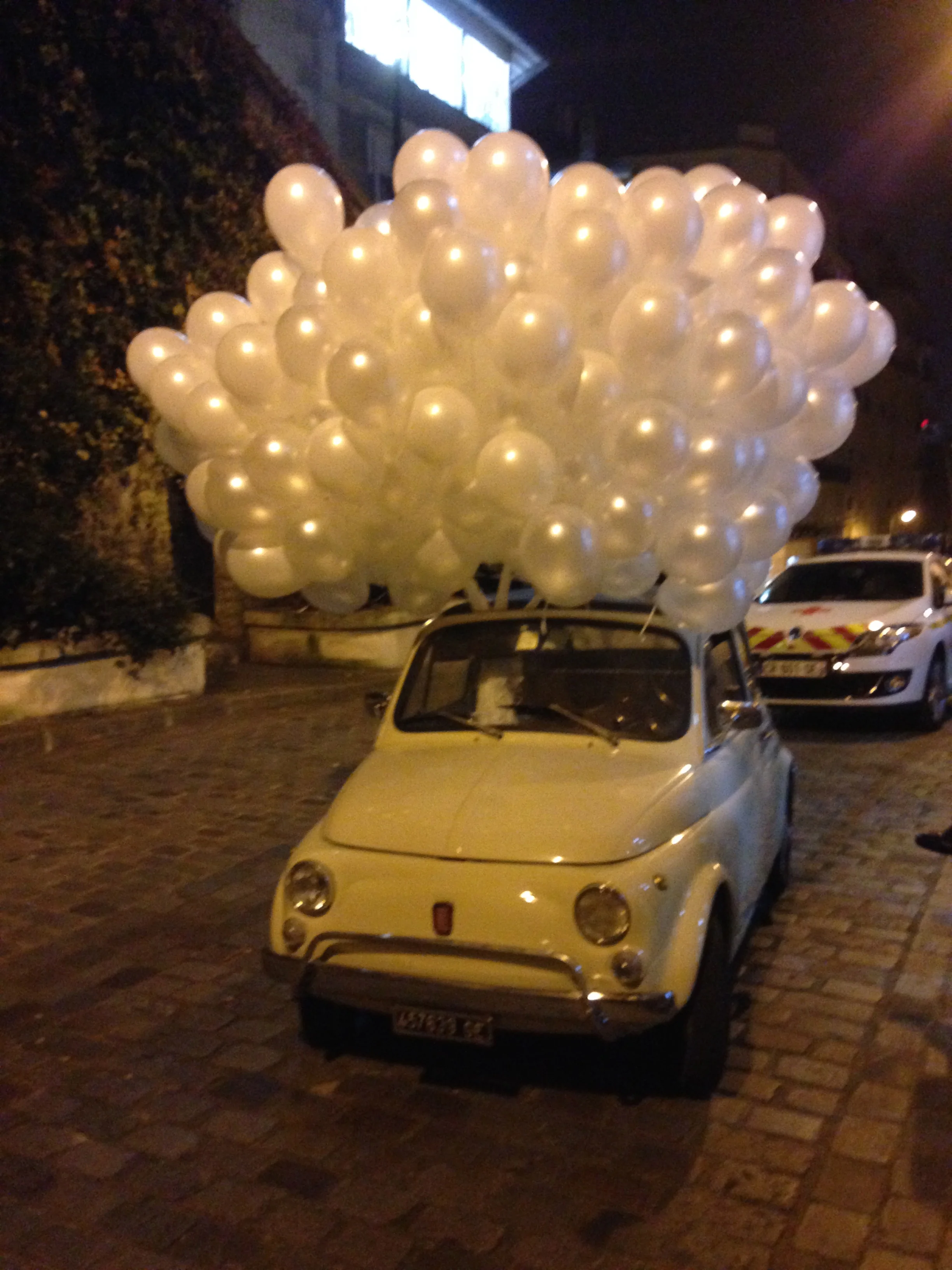 Friend's car carrying balloons for an event we were holding....priceless!