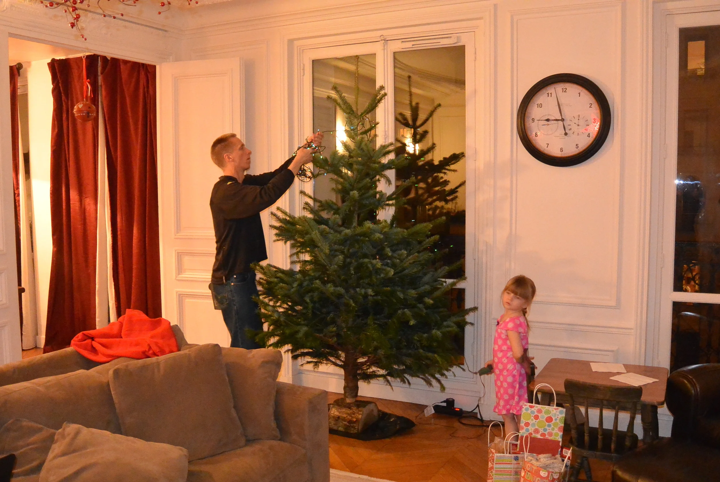 Putting up our "Charlie Brown" Xmas tree.