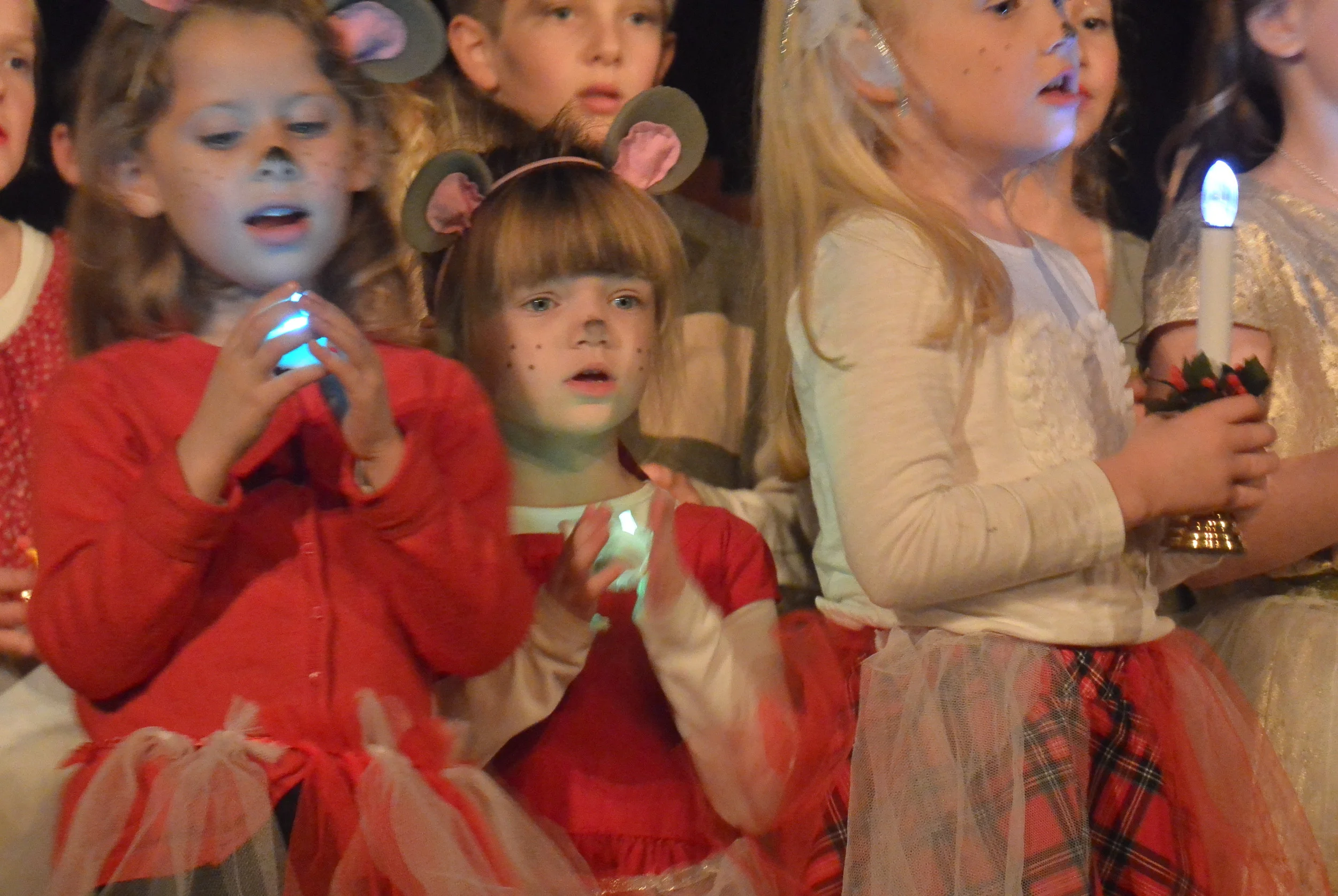 Peyton singing on stage