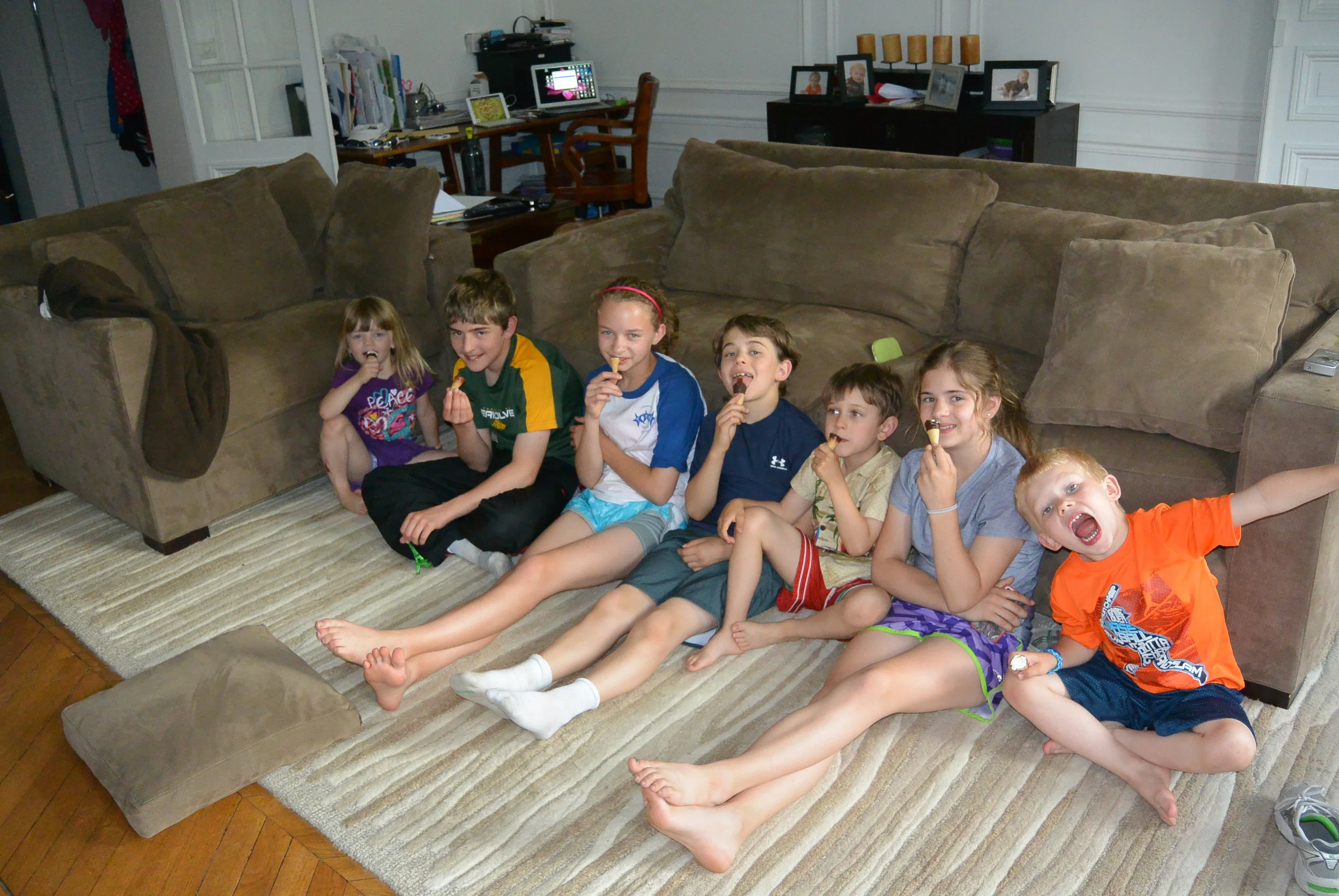 all enjoying ice cream on a hot day