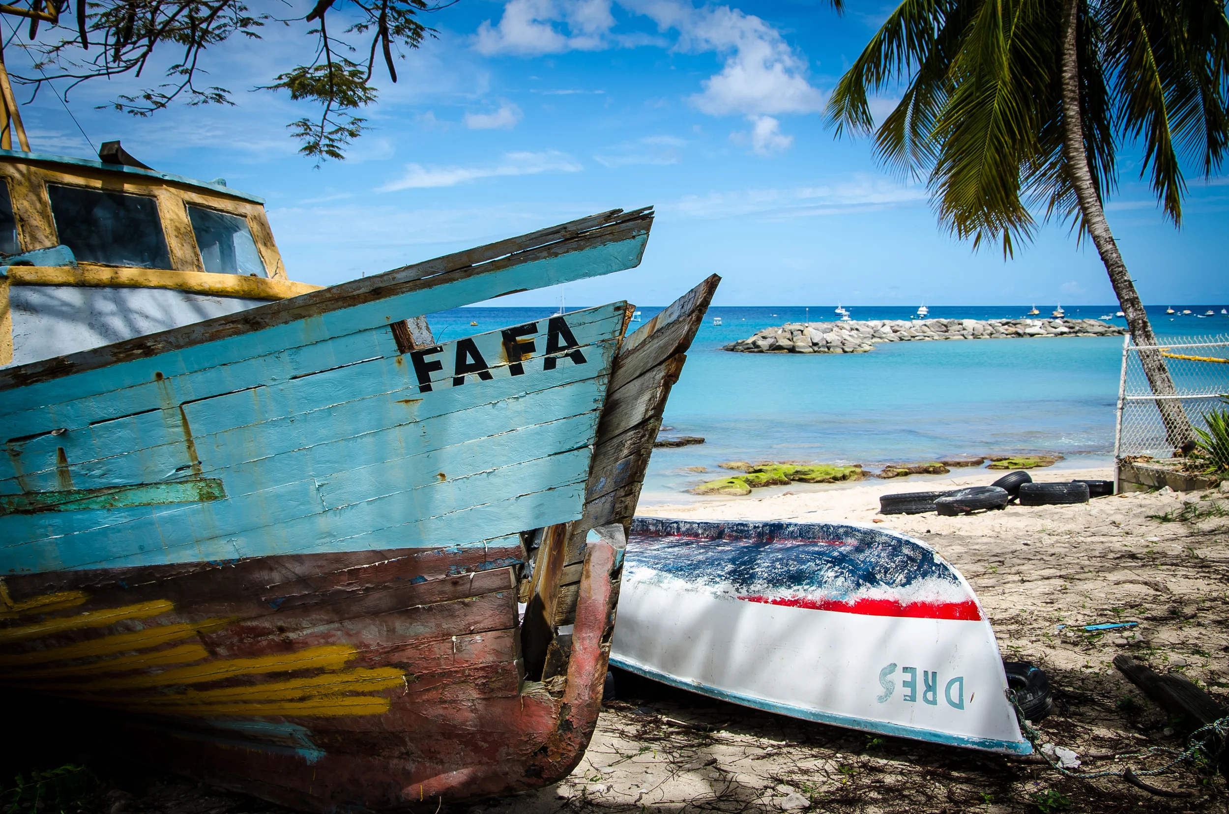 Old Fishing boats on the shore.