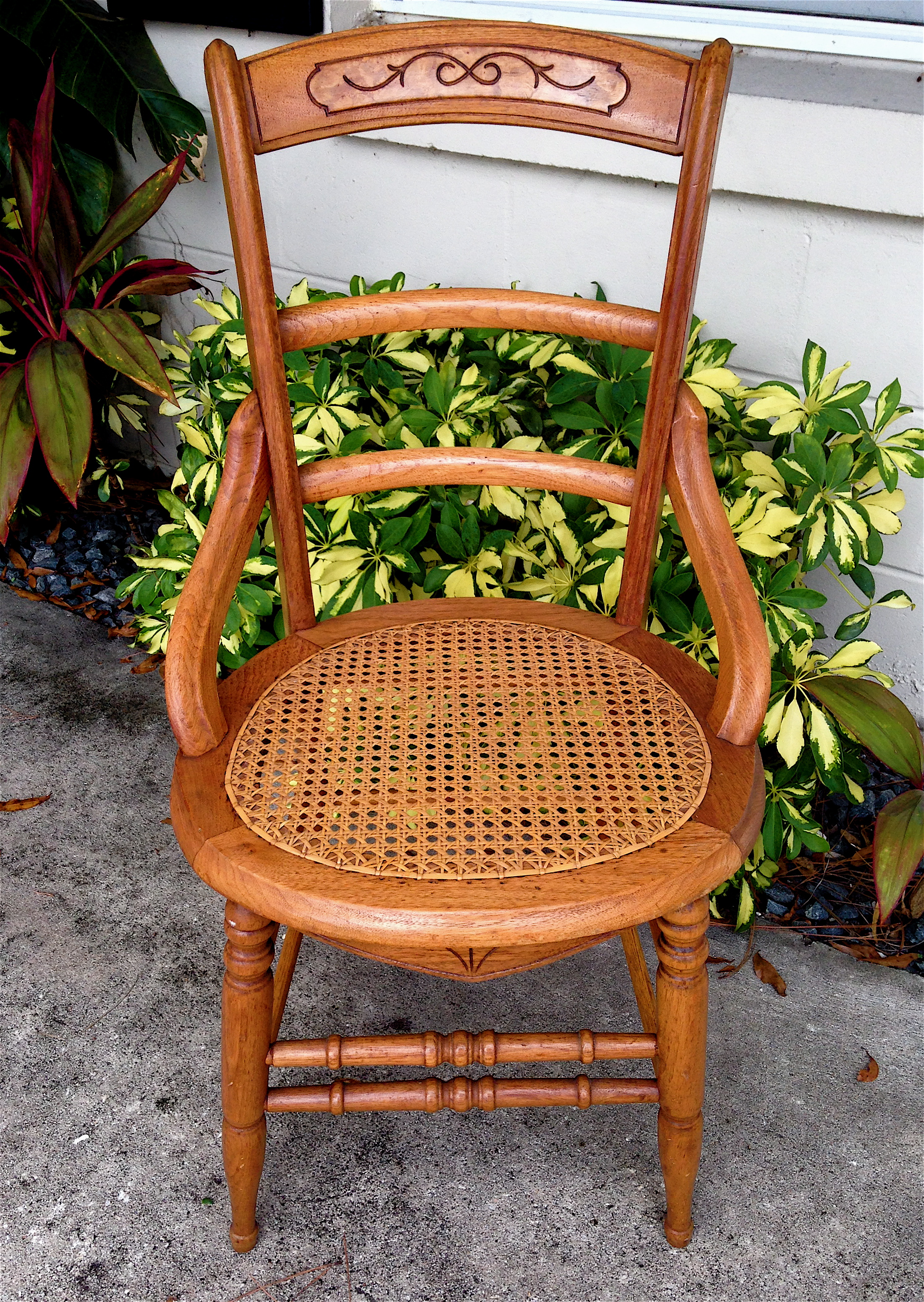 Victorian chair, cane seat, hip rests