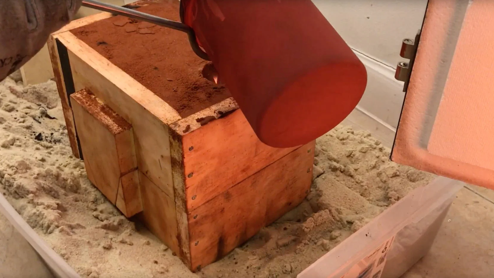 The Melted aluminum is poured into the sand mold previously prepared.