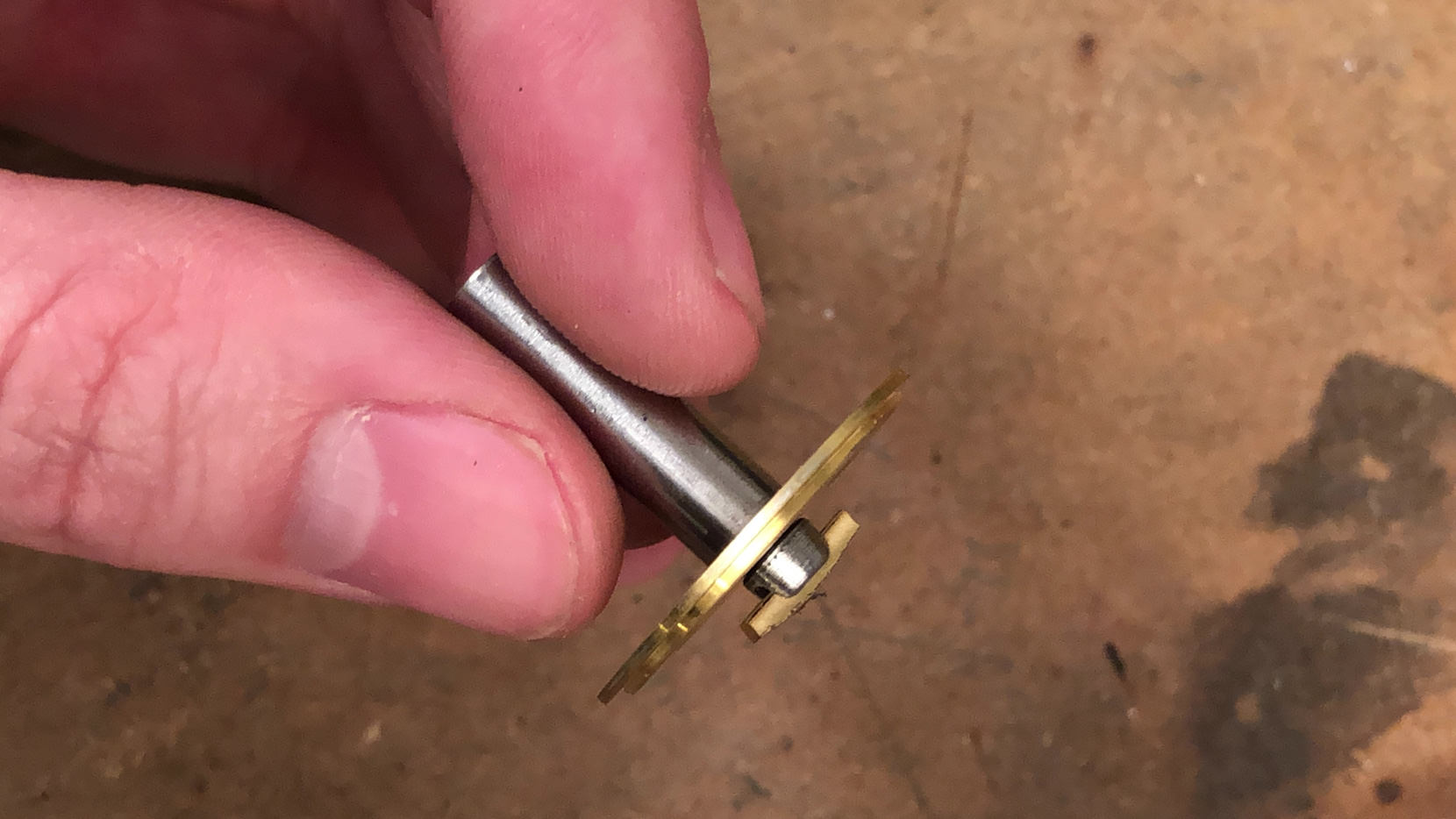 This parts are what will be holding the film spools. Its made of a steel shaft, a brass film seat, a M3 screw that has been rounded and had a slot filed down the middle and a small piece of brass that has been hammered into that slot.