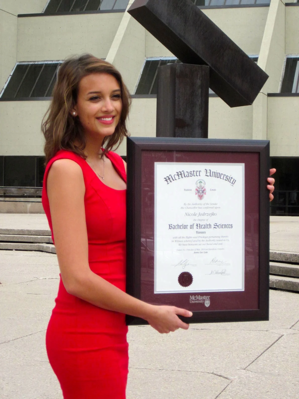 Nicole receiving her BHSc (Hons) from McMaster last spring. "First one in my family to receive a university degree, and I’m so proud of everything we’d done to get there."