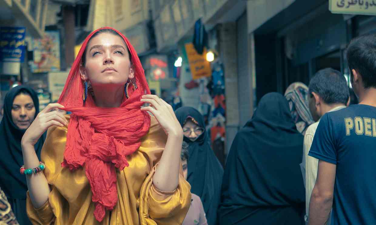 Model wearing a manteaux and scarf. Photo by Afra Pourdad/Afra's Corner | Source
