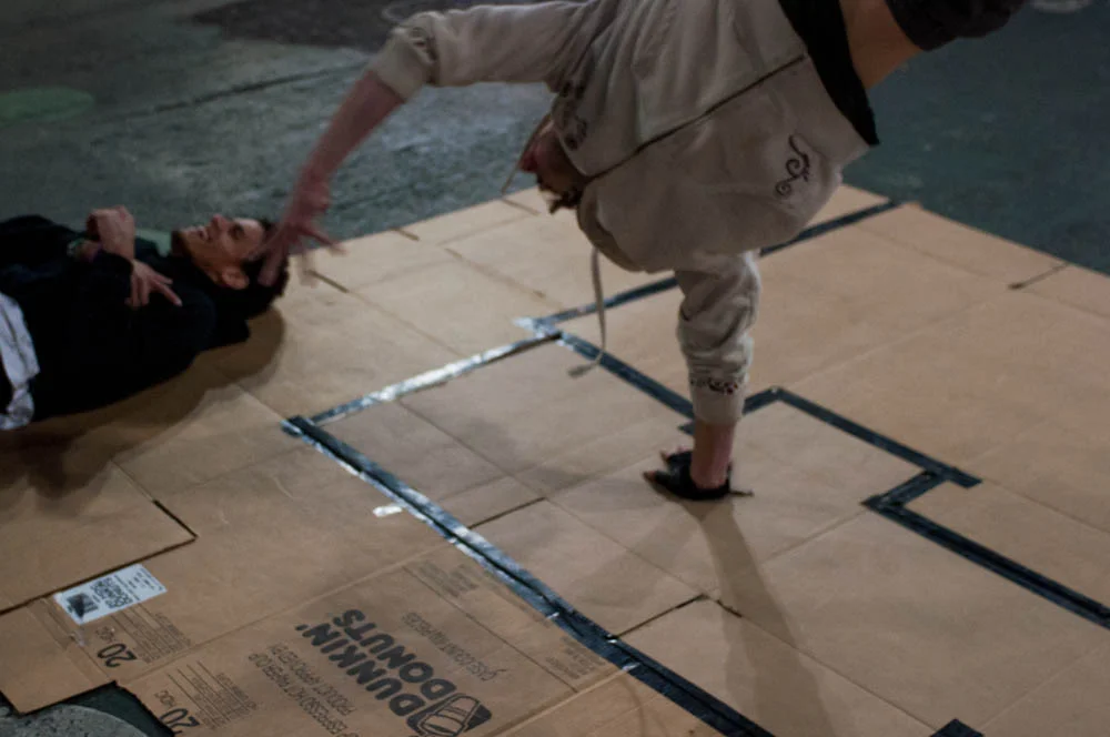 Bboy Slex and Cardona at a cardboard practice in 34th st and Broadway, Manhattan, New York.