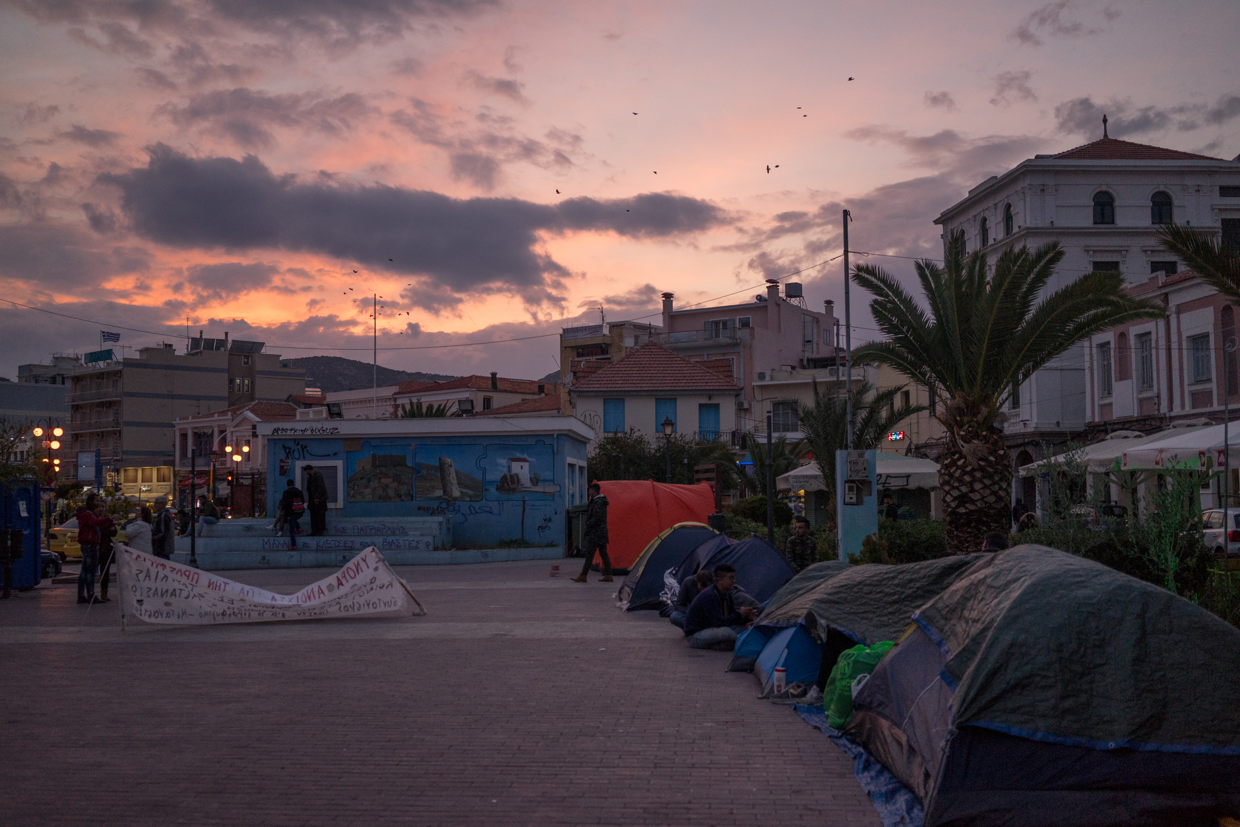 After a confrontation between Afghans and Arabs inside Moria, a group of refugees from Moria started a protest in Lesbos’ main square to demand better conditions and the chance to leave the prison island. Two weeks later, the demonstration escalated into a hunger strike. November 14, 2017. Moria, Lesbos, Greece. Protest camp in Sappho Square. 