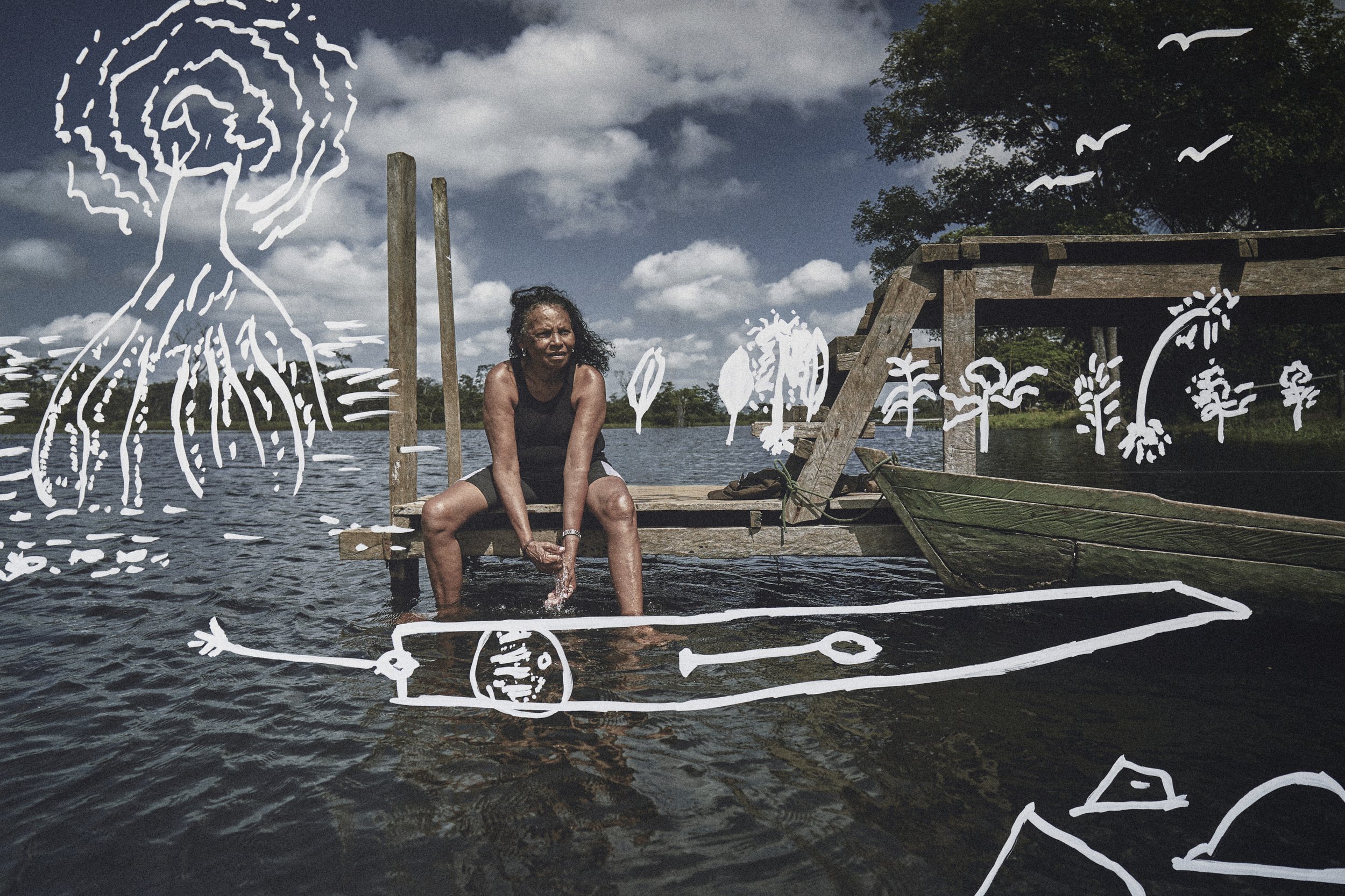  "In my memory, I'm sitting on my wooden pier, in front of my house that was later burned down. I am cutting fish fillets and squeezing lemon over them. In my house, we had several fruit trees, bananas, cashews, cacao, and also a Piranha tree, the tr