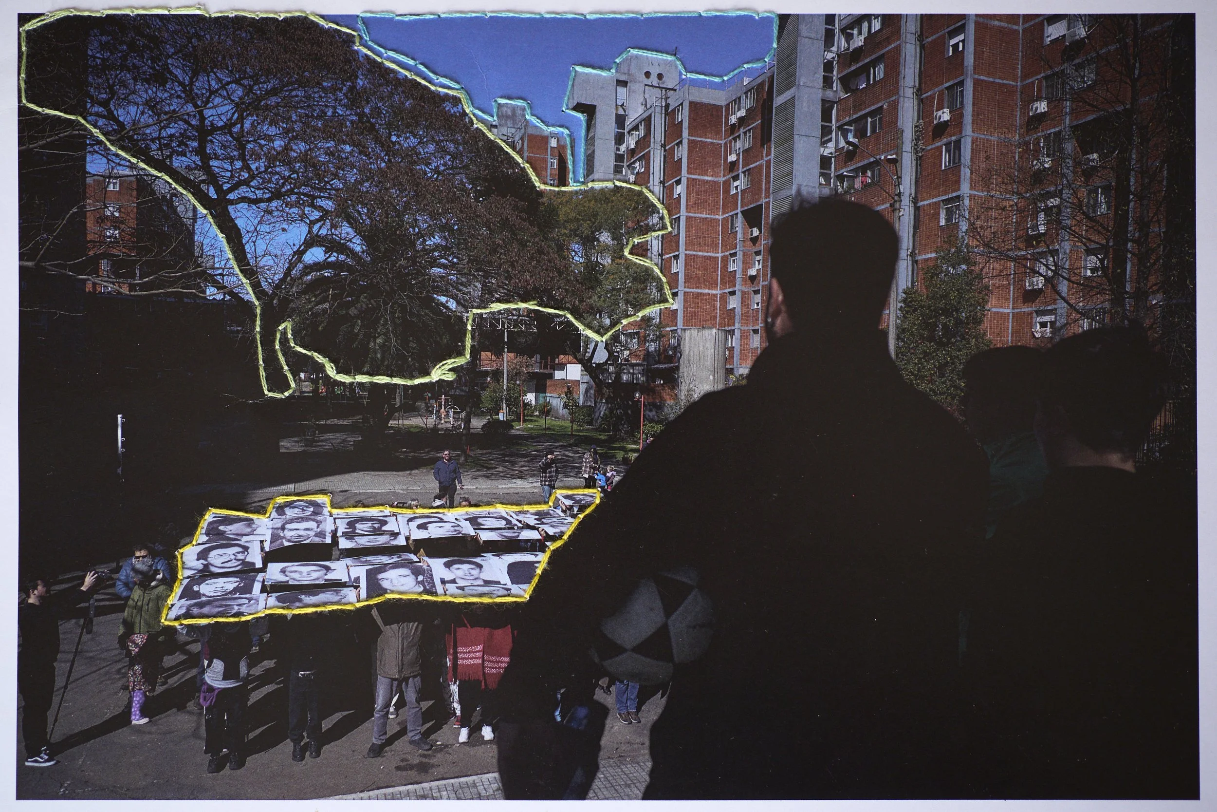  Santiago holds a soccer ball, and organizes people as they do the activity "holding memory" which remembers the people who were forcedly disappeared during the Uruguayan dictatorship. Embroidery by Emilio 