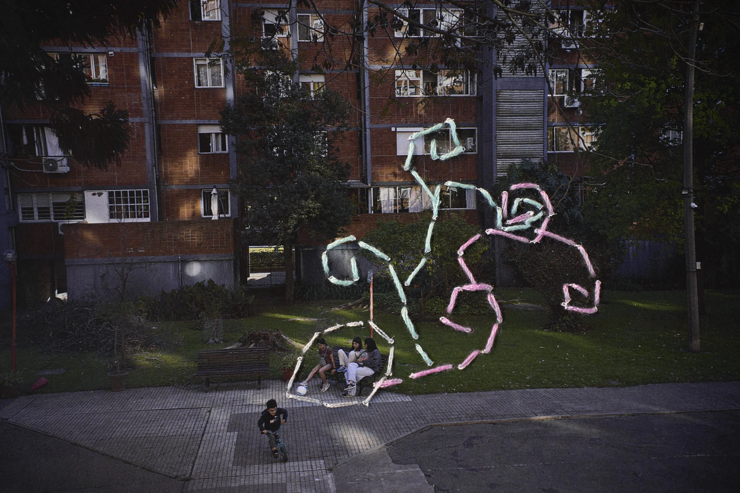  Kids play during a spring afternoon, in the common garden. Embroidery by Lola.  