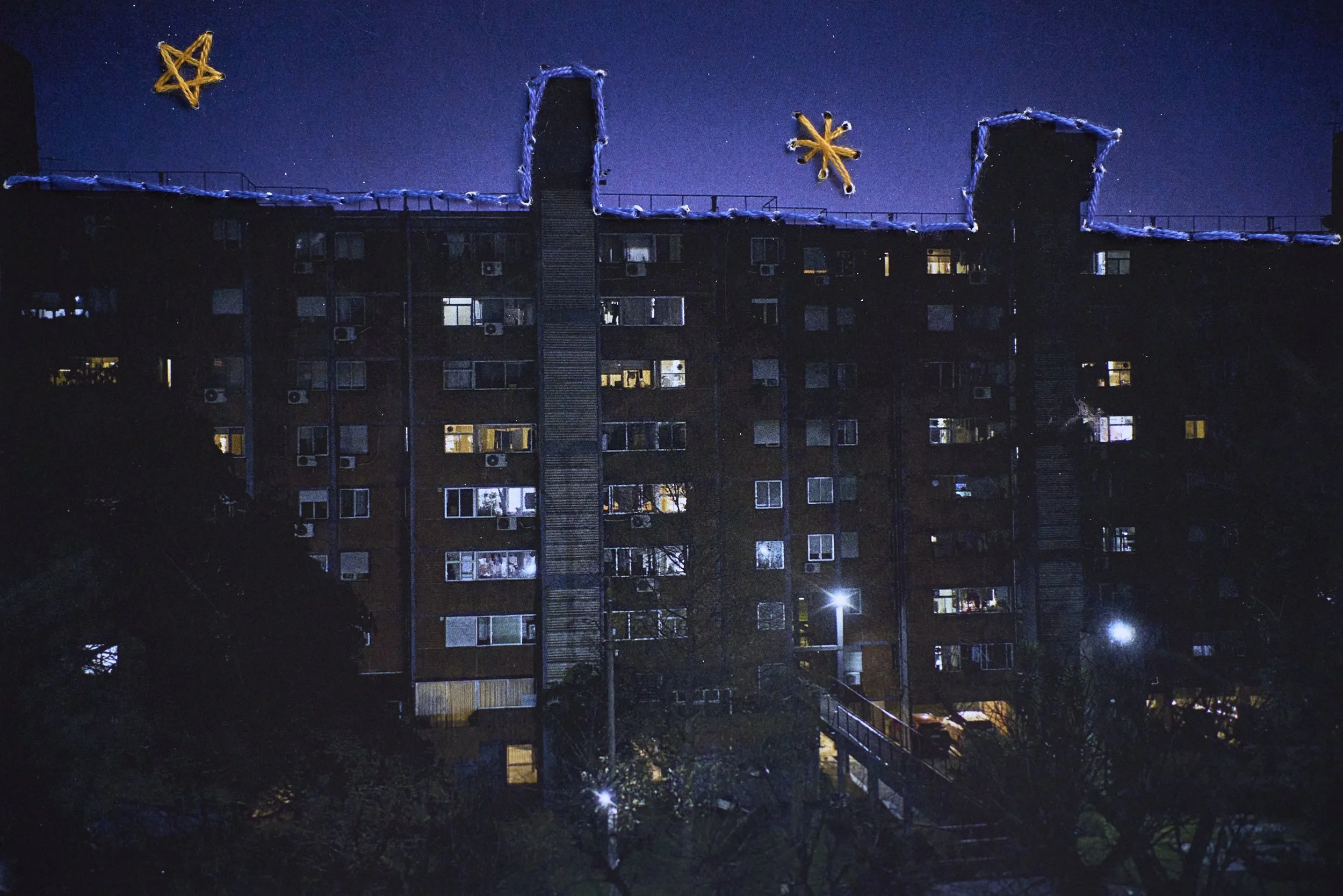  A view of one of the building from a window. Embroidery by Alfonsina and Emma.  
