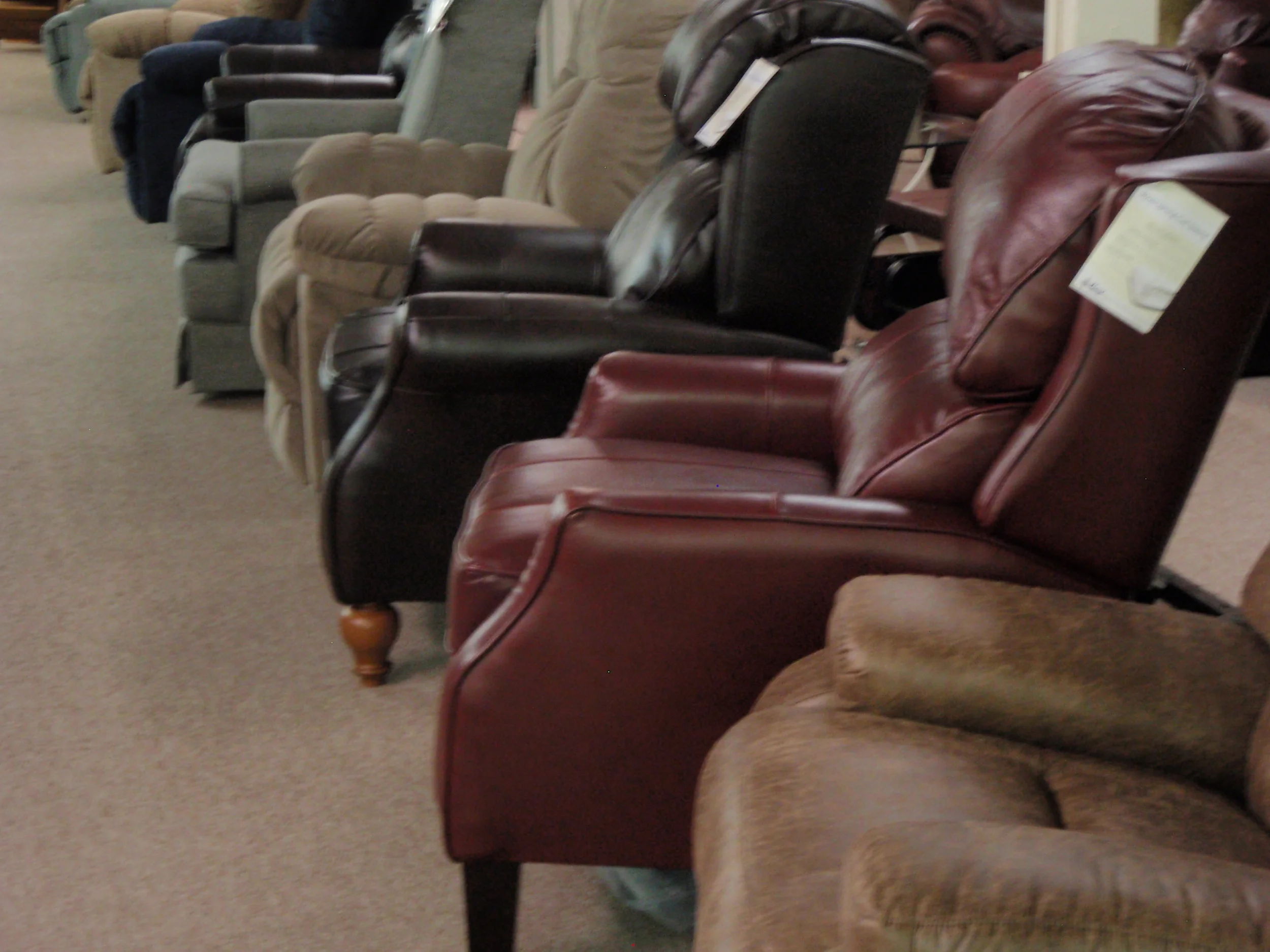 Just some of the many styles of Best recliners on the floor...