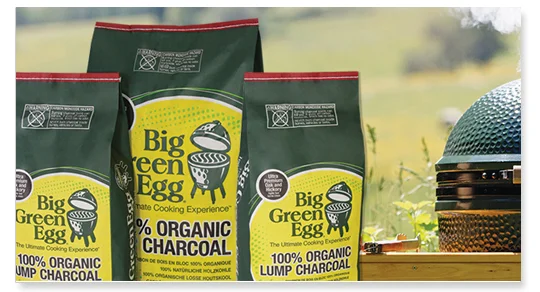 Why natural charcoal? What’s the difference? Big Green Egg charcoal contains only 100% natural American oak and hickory “ultra premium” hardwood … you will see — and taste — the difference immediately. What else would you want to cook with? Big Green Egg 100% Natural Lump Charcoal is easy to light and is usually ready to cook in about 10 minutes. Plus, it burns hotter and more efficiently, with more BTUs, than charcoal briquettes. Our premium lump charcoal also produces less ash so there is minimal waste and clean up … delivering more value and performance in every bag. But, most importantly, food tastes better, without harsh chemicals or odors that can be released when cooking with briquettes or other similar products. In fact, we recommend against ever using briquettes, lighter fluids or any quick-light charcoal product in a Big Green Egg. Natural Lump Charcoal – 390011 20 lb / 9 kg bag Natural Lump Charcoal – 110503 10 lb / 4.5 kg bag Manufactured in the USA from premium, select hardwoods Big Green Egg Natural Lump Charcoal meets EPA environmental guidelines and is CE Certified in the European Union (EU).