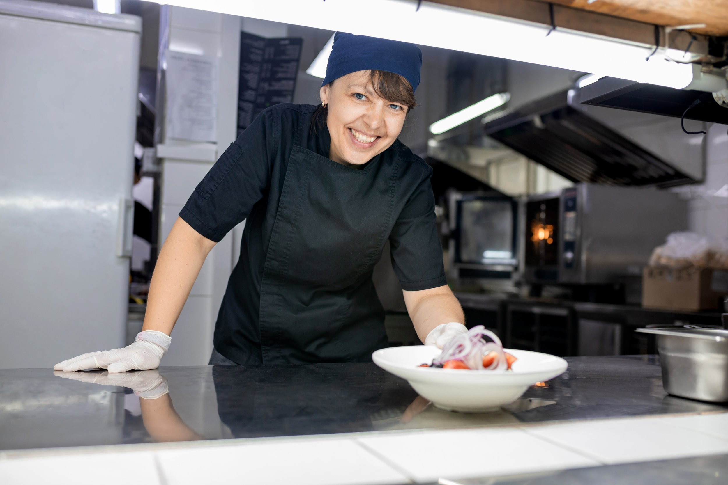 chef-kitchen-gives-readymade-greek-salad-concept-sooking-vegetarian-salad.jpg