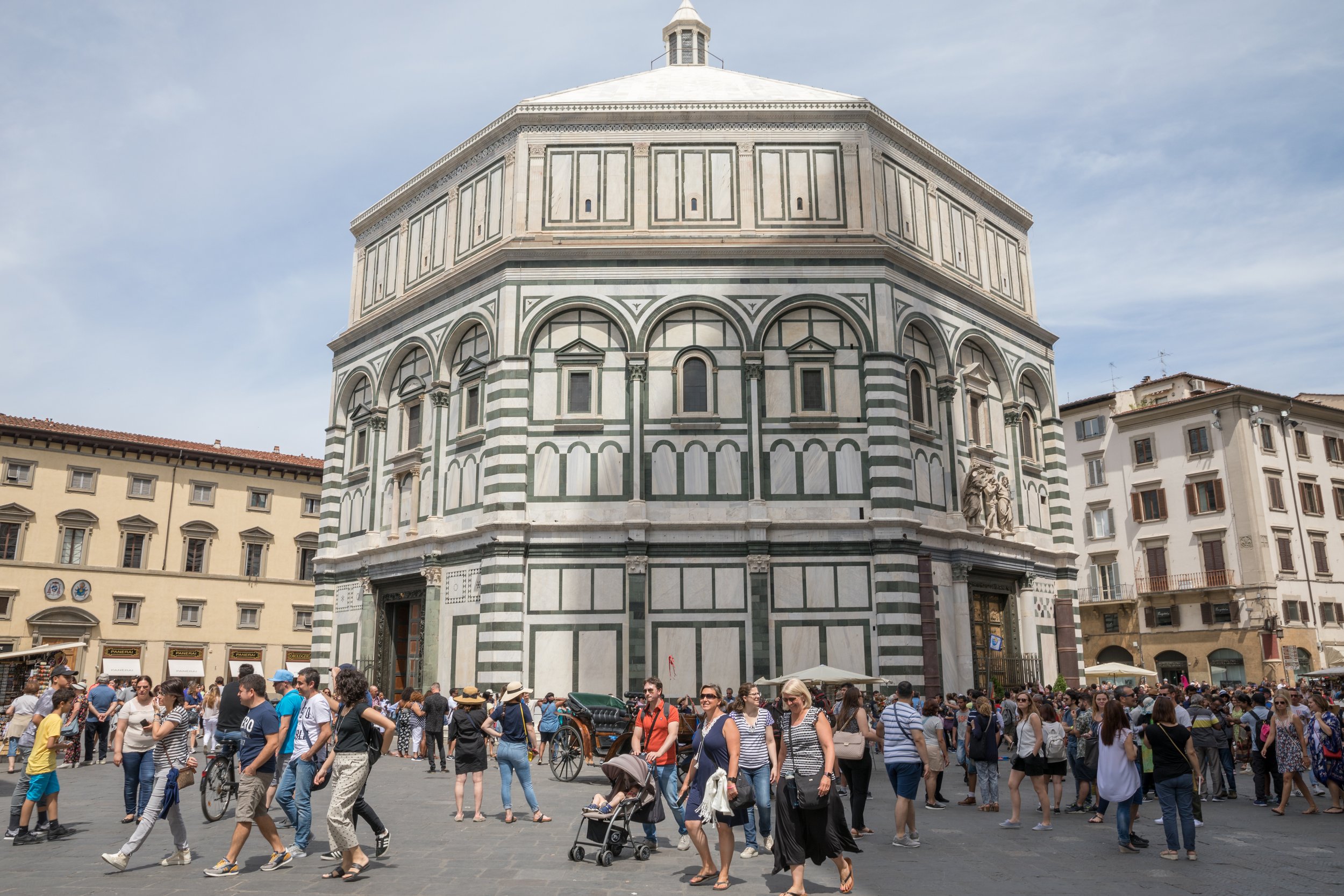 florence-italy-june-24-2018-panoramic-view-exterior-florence-baptistery-battistero-di-san-giovanni-piazza-del-duomo-people-walk-square-summer-day.jpg