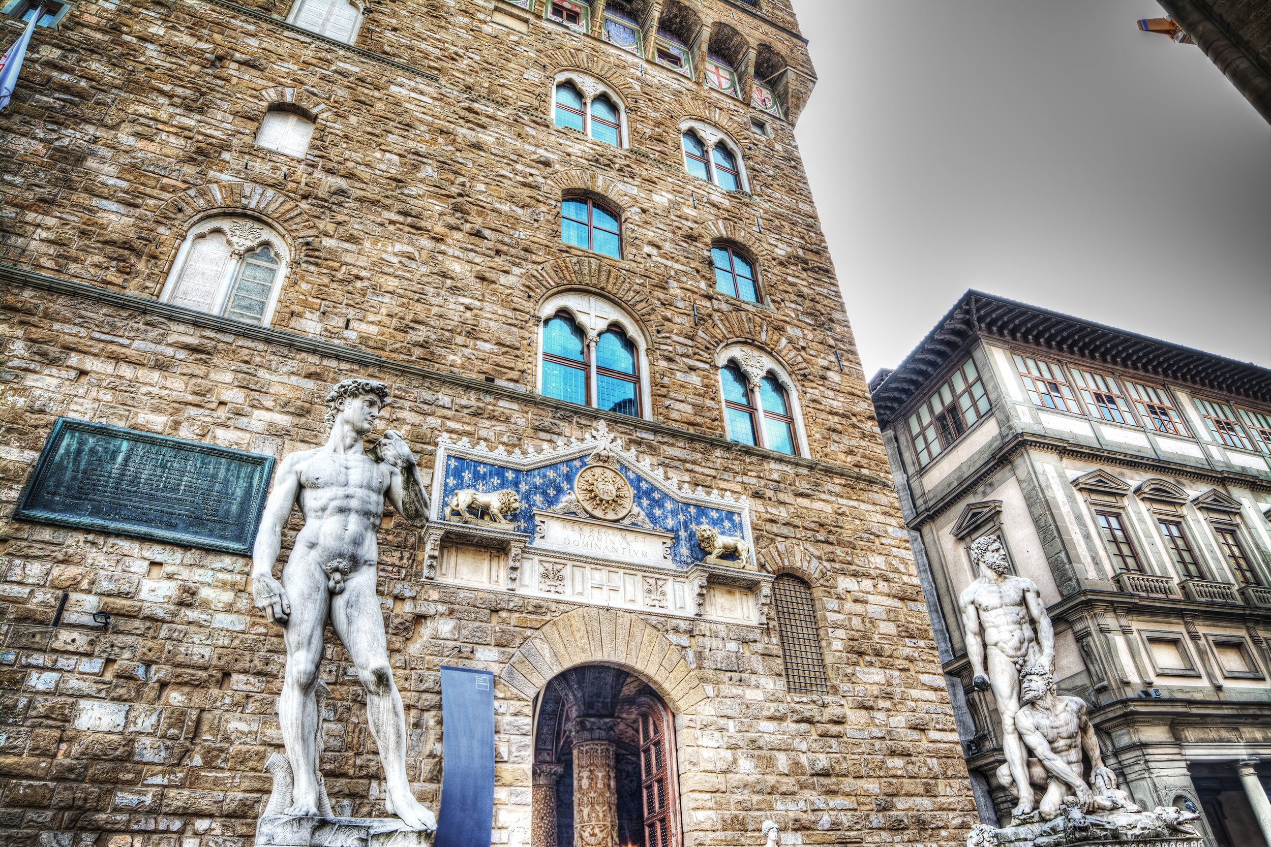  Exterior of Palazzo Vecchio with reproduction of The David where the original once stood 