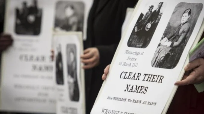 posters at vigil 100317.jpg