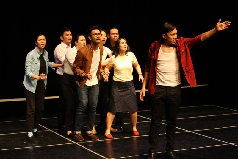 Alfred Loh (front, left) together with the cast of Pulse, in a rehearsal .
