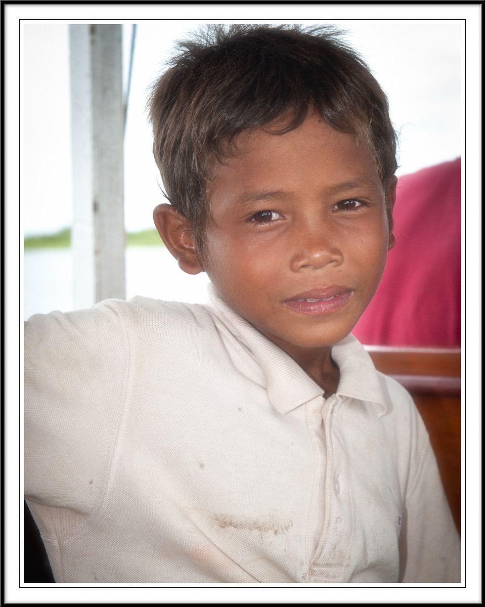      

 
  Young boy who works on tourist boat  Tonlé Sap Lake Cambodia
 






















     