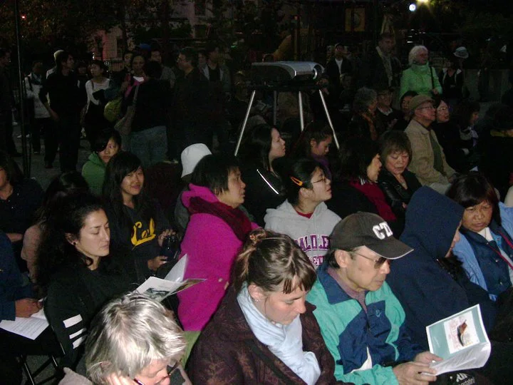 Audience at Portsmouth Square in San Francisco's Chinatown.