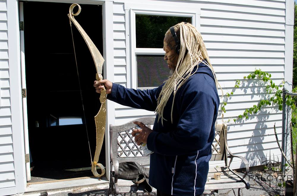 Director Ahura Z. Diliiza putting the final touches on my new bow.