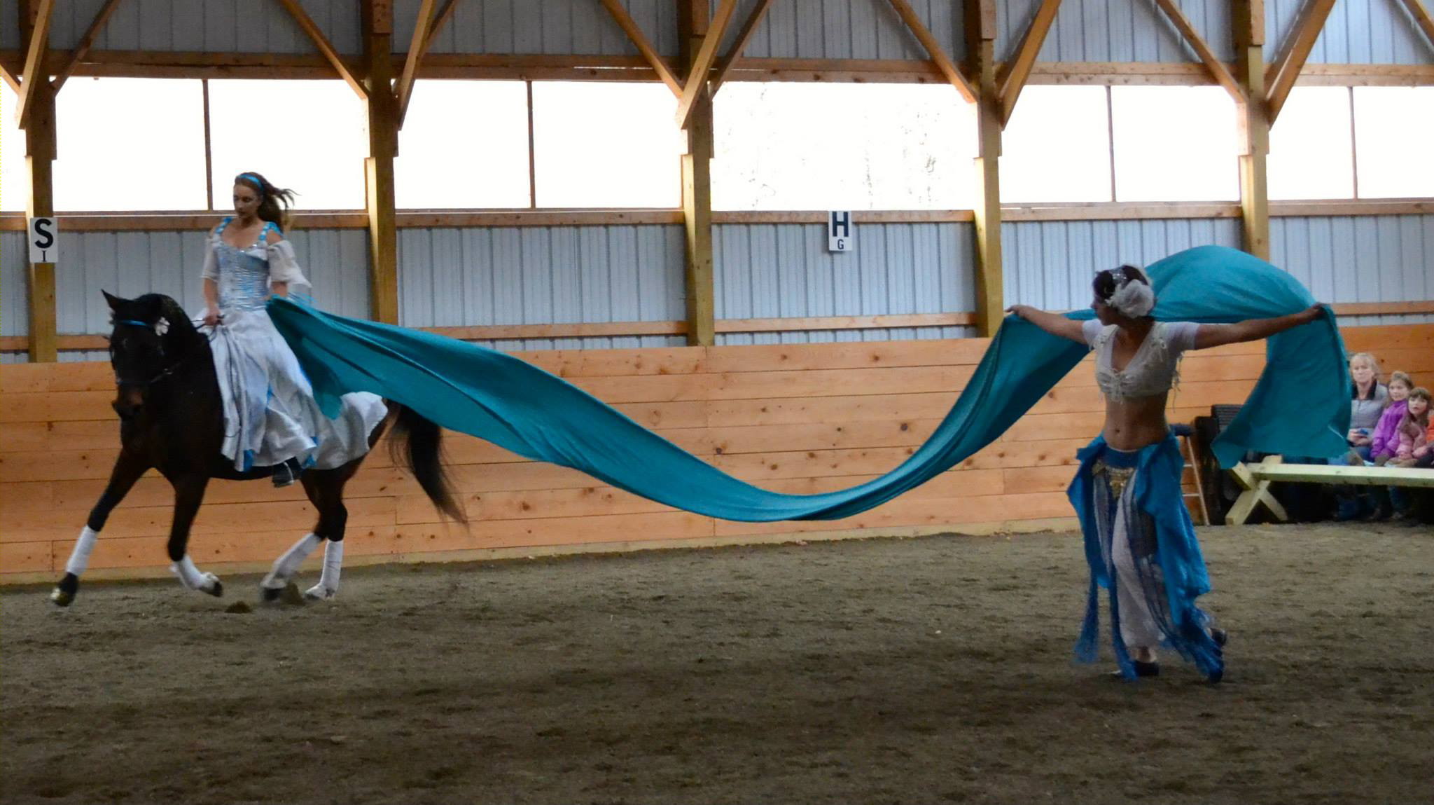 Riding Rovandio with Lydia Rose Spencer dancing. The long veil is harder to manage but it is beautiful in motion! Photo taken by Laurie Harvey's assistant Kaitlyn.