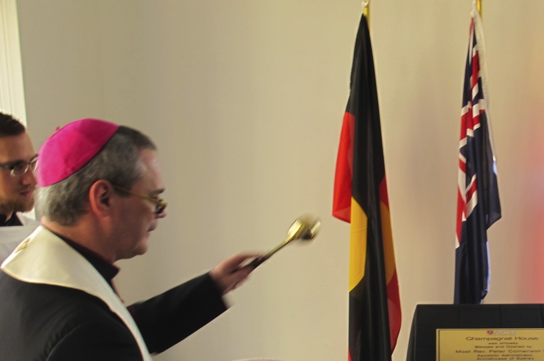 Bishop Peter Comensoli blesses the plaque.