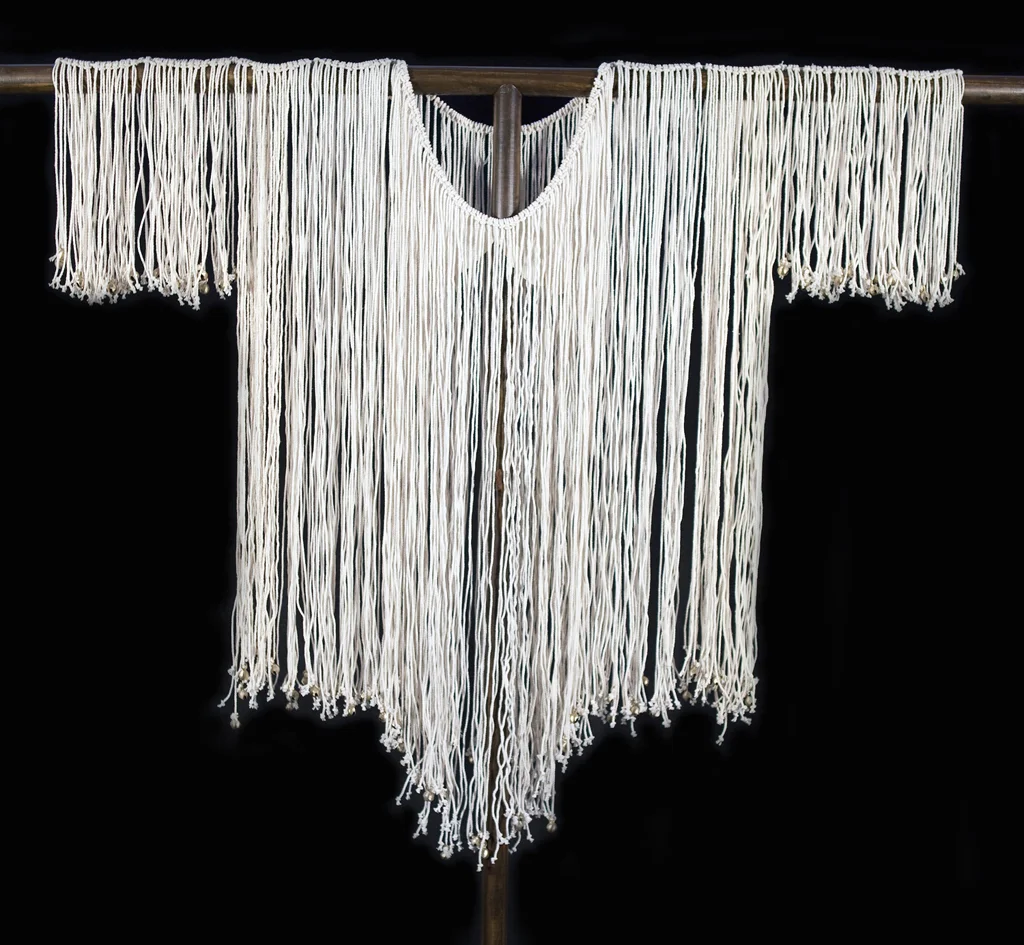 Nanny of the Maroons War Shirt (Jamaica) Materials: Cotton Organdy, Cotton Twine, Pumpkin Seeds, Brass Bells,
Gold Paint, Poly/Cotton Thread Techniques : Rope Knotting, Patternmaking, Hand
stitching and Machine Construction
2010