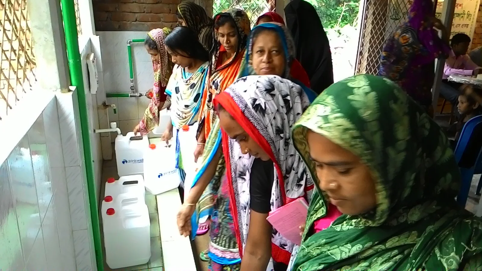 Drinkwell_Women In Line at Manikganj.jpg