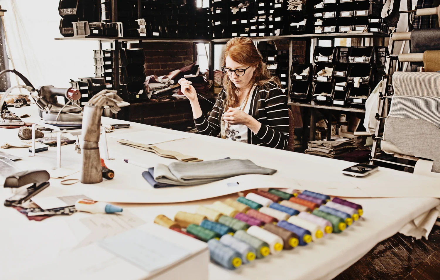 Handcrafting Otis James Nashville ties in his Marathon Village studio.