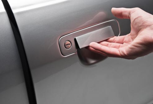 getty_rf_photo_of_hand_opening_car_door.jpg