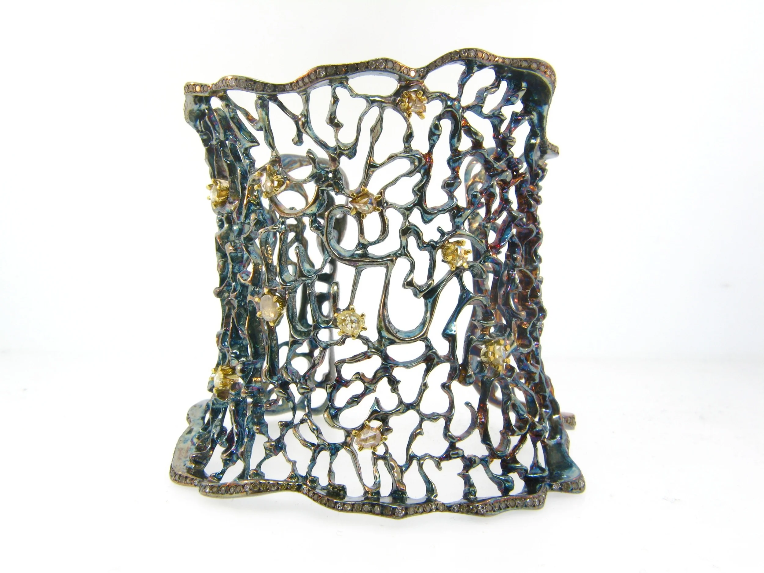 AMAZING oxidized fluorescent diamond web cuff by Atelier Minyon